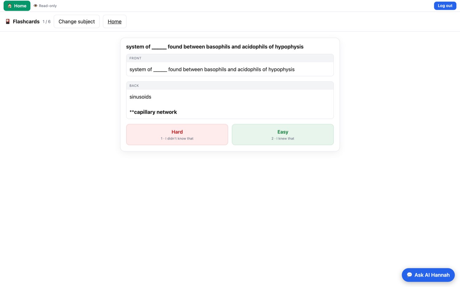 A flashcard with the answer revealed and Hard / Easy grading buttons